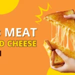 A close up of hands holding a crab meat grilled cheese.